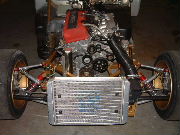Radiator and front suspension